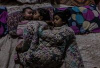 Fatma, Tiktum and their brother Abdallah lay in bed before going to sleep. The whole family sleeps on a blanket on the floor, in the main room of the house.
Chibayish, Iraq,15/10/2018